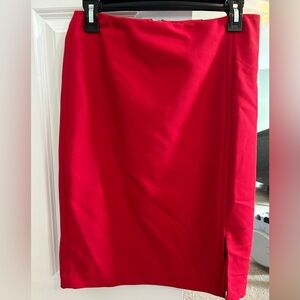 White House Black Market beautiful red mid length skirt. Size 4